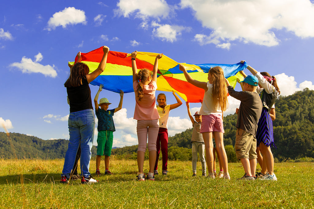 How do I help my child play well with other children?